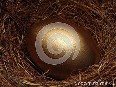 Golden Nest Egg Stock Photo