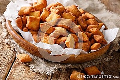 Golden Nigerian snack Chin Chin of deep-fried crispy dough with Stock Photo