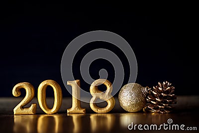 Golden Number 2018 placed on dark elegant glamour night tone background for new year 2018 celebration concept Stock Photo