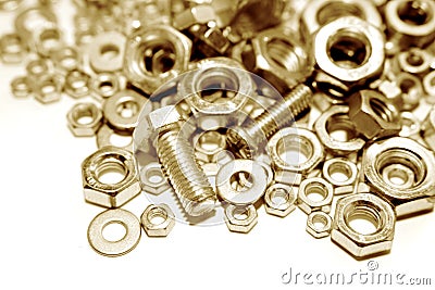 Golden Nuts & Bolts Stock Photo