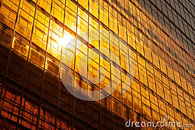 Golden office building glass facade - business background Stock Photo