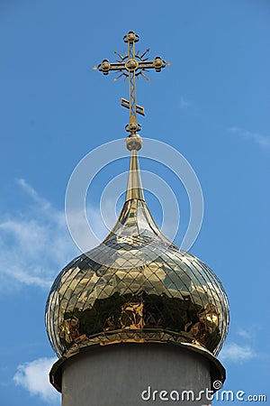 Golden onion dome on top of the belfry at the Presentation of the Child Jesus church in Tiraspol, Transnistria, Moldova Stock Photo