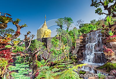 Golden pagoda sculpture,stone carving at Wat Tham Pha Daen.Sakon Nakhon province,Thailand Stock Photo
