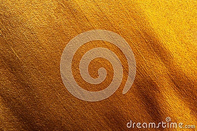 Golden painted texture decorative background. Bright Macro phot Stock Photo