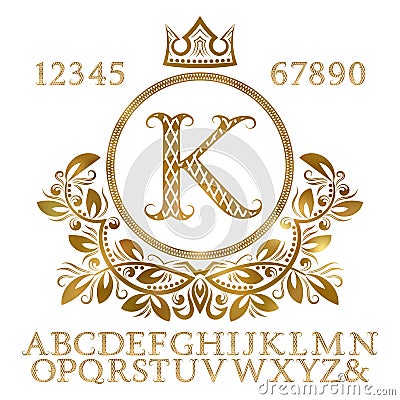 Golden patterned letters and numbers with initial monogram in coat of arms form. Shining font and elements kit for logo design Vector Illustration