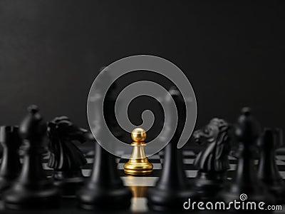 Golden pawn chess encounter black chess team. Leadership Concepts Stock Photo