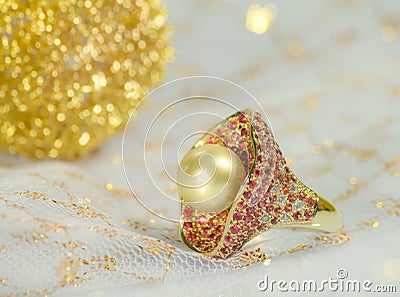 Golden pearl ring Stock Photo