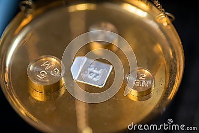 Golden pharmaceutical scales close up. Antique and precision concept Stock Photo