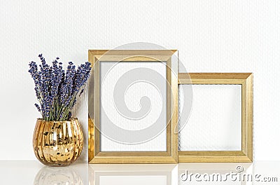 Golden picture frame and lavender flowers. Vintage style mock up Stock Photo