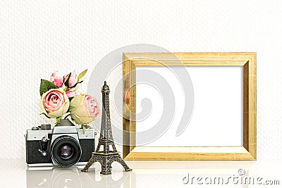 Golden picture frame rose flowers vintage camera Paris travel Stock Photo