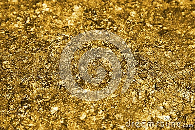 Golden pieces and sequins textured background Stock Photo