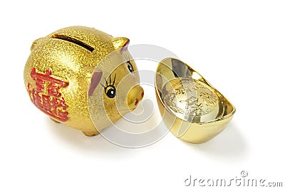 Golden Piggy Bank with Gold Ingot Stock Photo