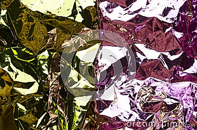 Golden and pink crumpled material as a background.Empty space for design Stock Photo