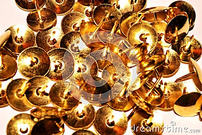 Golden pins on white background. image Stock Photo