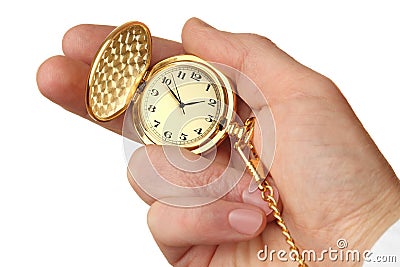 Golden pocket watch in a businessman's hand. Stock Photo