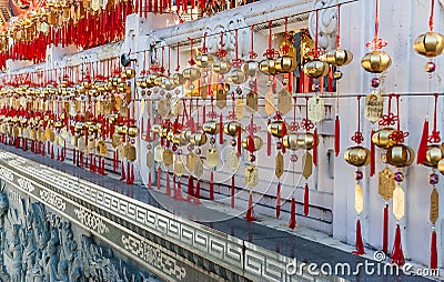 Golden prayer bells of the Wenwu temple Stock Photo