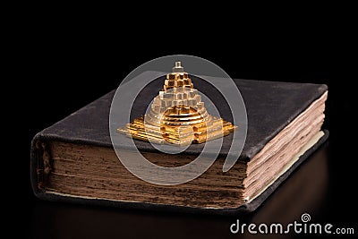 The Golden Pyramid and the Old Sacred Book Stock Photo