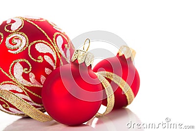 Golden and red christmas ornaments on white background. Merry christmas card. Stock Photo