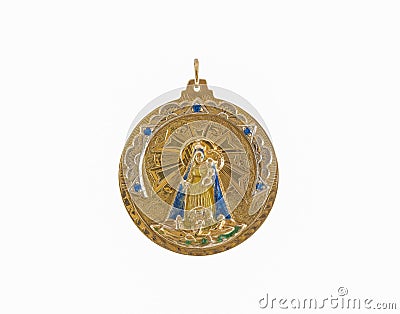Golden religious pendant under the lights isolated on a white background Stock Photo