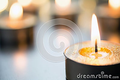 Golden Romantic Tea Lights In Bright Xmas Atmosphere On Wooden Table With Bokeh Stock Photo