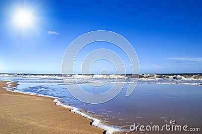 Golden sand on sunny beach Stock Photo