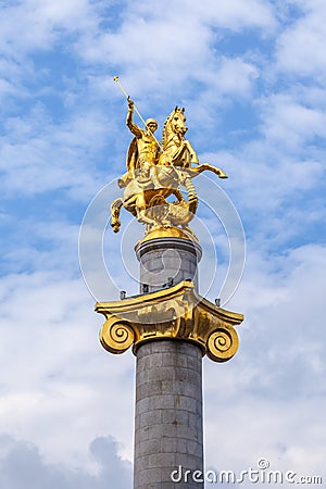 Golden sculpture of Saint George on the Freedom Square in Tbilisi Editorial Stock Photo