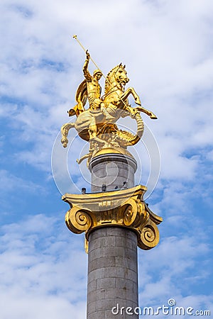 Golden sculpture of Saint George on the Freedom Square in Tbilisi Editorial Stock Photo