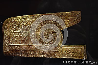 Golden Scythian artifact, archeology, golden ancient artifacts, Museum of jewelry of Ukraine, Kiev Editorial Stock Photo