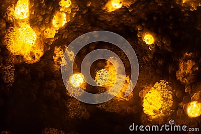 Golden shiny lights bokeh background. Yellow glittering blurred texture. Lights and bubbles abstract defocused background Stock Photo