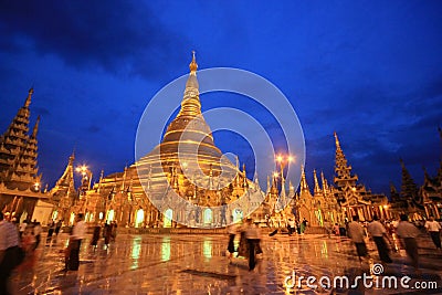 Shwedagon Pagoda with reflection and twilight Editorial Stock Photo