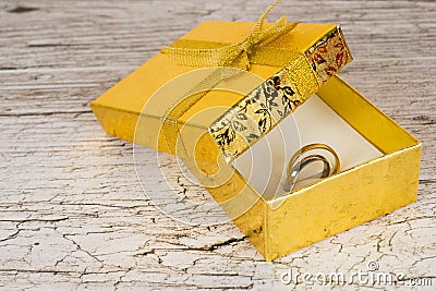 Golden and silver pair rings in gift box Stock Photo