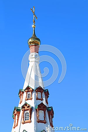 Golden small dome with cross of russian orthodox church Stock Photo