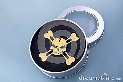 Golden spinner in the form of a skull Stock Photo