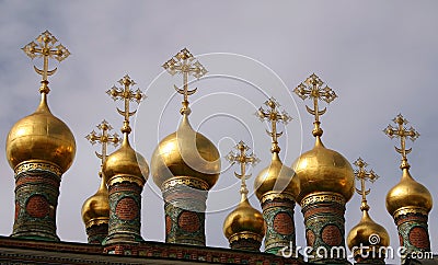 Golden Spires of the Terem Palace against a cloudy sky Moscow Stock Photo