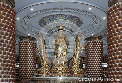 Golden statue goddess of Mercy Guanyin or Quan Yin statue at Fo Guang Shan Thaihua Temple Stock Photo