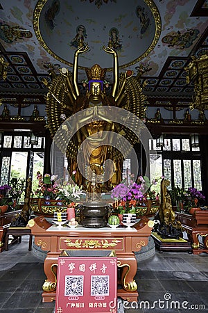 Golden Statue of Guanyin Bodhisattva with Thousand Hands and Thousand Eyes Editorial Stock Photo