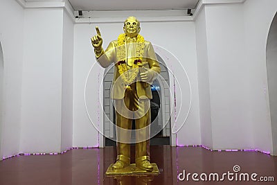 Golden statue inside Dr. Ambedkar Mani Mandapam in Puducherry, India Editorial Stock Photo