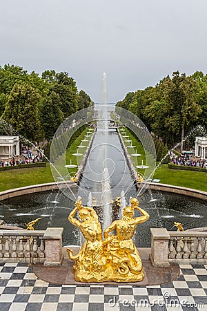 Golden statues and fountains in the garden of Peterhof palace in St Petersburg, Russia Editorial Stock Photo