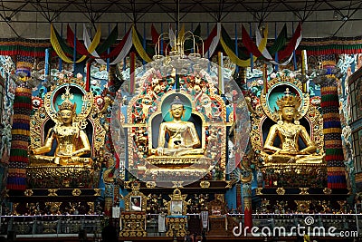 Golden statues of Gautama Buddha, Padmasambhava and Amitayus. Stock Photo