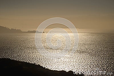 Golden sun across texture of the San Francisco Bay Stock Photo