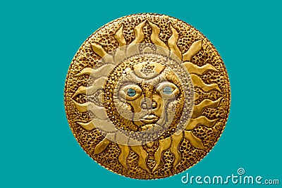 Golden sun handcraft from Mediterranean isolated Stock Photo