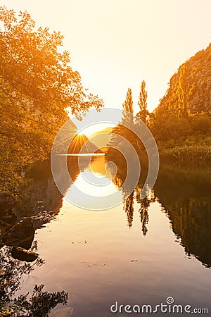 Golden sunset over the canyon of river Cetina, nature vertical background, Omis, Croatia Stock Photo