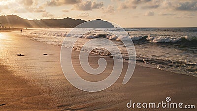 Sunset with palm trees in Sayulita beach Stock Photo