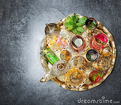 Golden tea table decoration Arabic traditional dishes Stock Photo