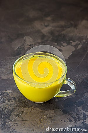 Golden turmeric milk. Healthy and aromatic detox beverage Stock Photo