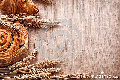 Golden wheat ears sweet croissant roll with Stock Photo