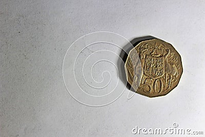 golden yellow coin on top with white becgroun Stock Photo