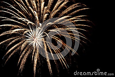 golden yellow fireworks on an isolated black background for design decoration of holidays, the new year, as well as independence d Stock Photo