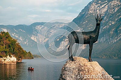 Goldenhorn (Zlatorog) statue near the Lake Bohinj is a reference to a popular Slovenian Editorial Stock Photo