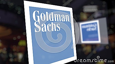 The Goldman Sachs Group, Inc. logo on the glass against blurred business center. Editorial 3D rendering Editorial Stock Photo